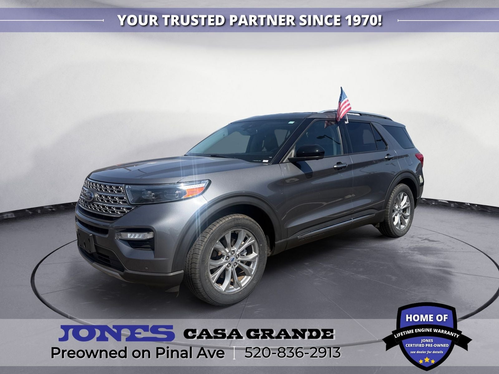 2023 Ford Explorer Limited in Carbonized Gray Metallic — front three-quarter view