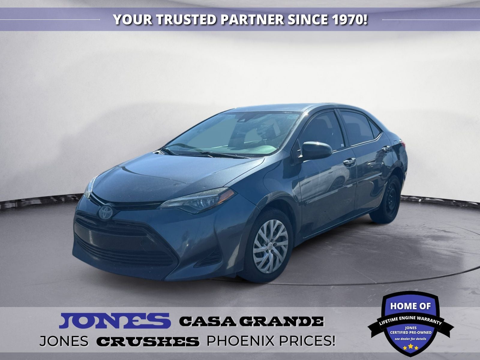 2018 Toyota Corolla LE in Slate Metallic — front three-quarter view