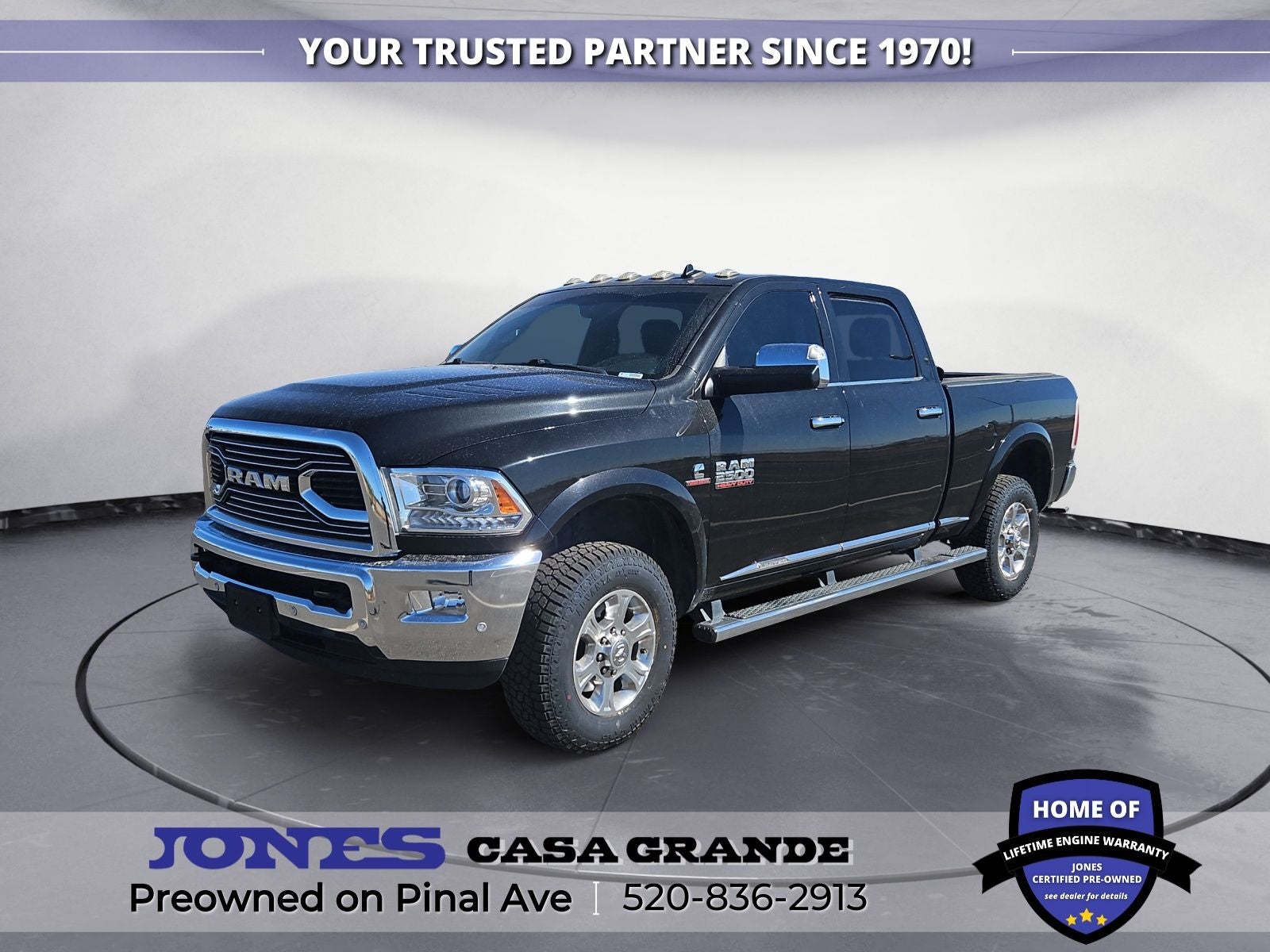 2018 RAM 2500 Laramie Longhorn in Brilliant Black Crystal Pearlcoat — front three-quarter view