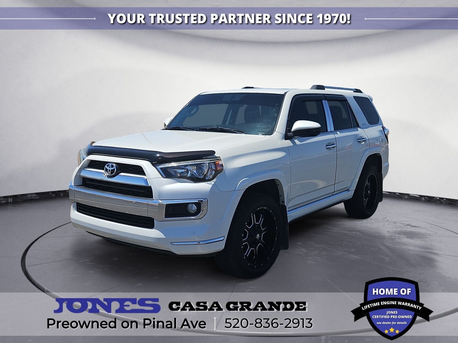 2015 Toyota 4Runner Limited in Blizzard Pearl — front three-quarter view